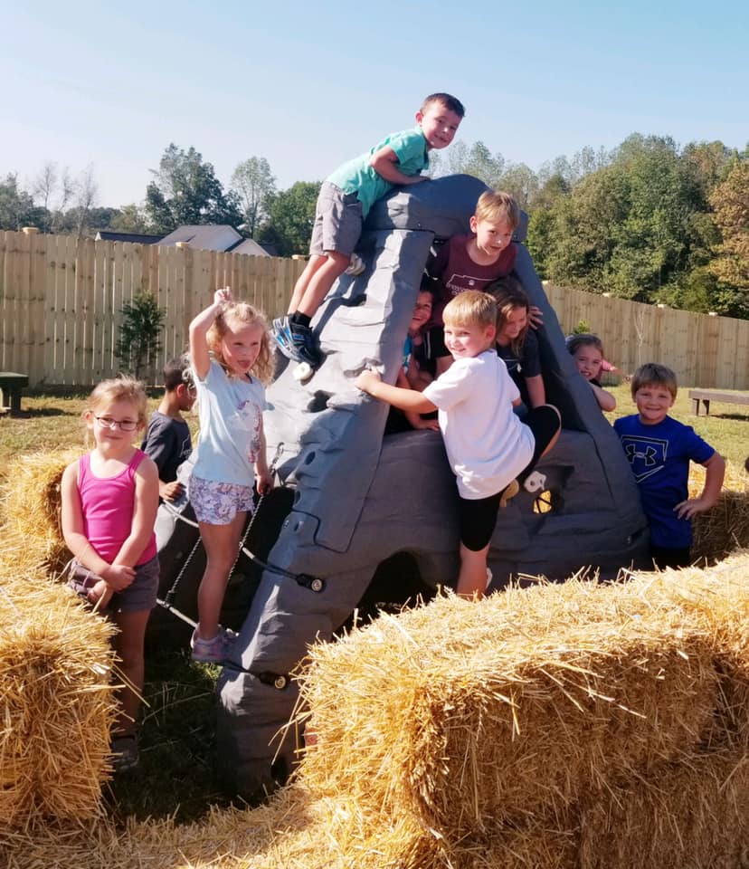Families enjoying the farm at midday at Shuckle's Corn Maze and Pumpkin Patch