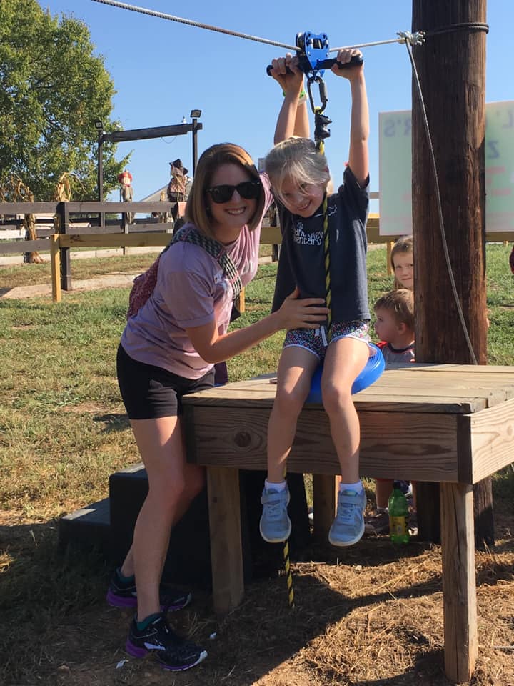 Children on the slides and swings at Shuckle&rsquo;s Corn Maze near Nashville